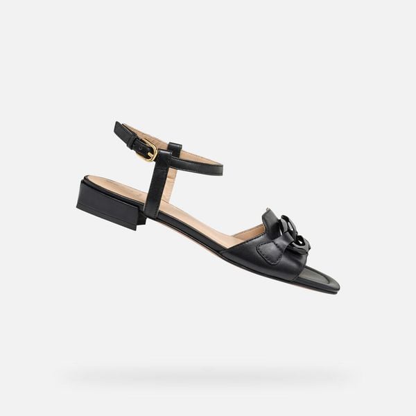 Sandały GEOX D NEW ERAKLIA 15 Czarny. Czarne sandały Geox, bez wzorów, ze skóry, bez obcasa, bez zapięcia. Za 434.99 zł.