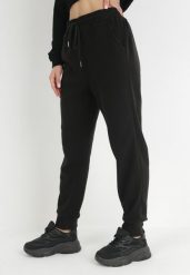Czarne Spodnie Dresowe z Gumką w Pasie Shimbi. Czarne jeansy Born2be, xl, bez wzorów, z dresówki, długie. W wyprzedaży za 33.99 zł.