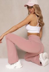 Różowe Legginsy Dzwony High Waist Korivienne. Czerwone legginsy Renee, bez wzorów, z jeansu, eleganckie. W wyprzedaży za 39.99 zł.