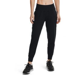 Spodnie Under Armour Meridian, Kobiety. Czarne spodnie dresowe Under Armour, bez wzorów, z dresówki, długie. Za 421.00 zł.