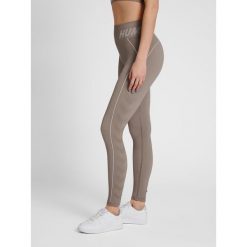 Damskie legginsy ze średnim stanem Hummel TE Christel. Szare legginsy Hummel, bez wzorów, sportowe. Za 158.50 zł.