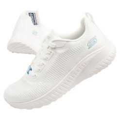 Buty Skechers 117209/OFWT białe. Białe buty treningowe bez wzorów, z materiału, bez zapięcia. W wyprzedaży za 388.82 zł.