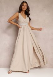 Jasnobeżowa Rozkloszowana Sukienka z Wycięciem i Paskiem w Cyrkonie Elineta. Brązowe sukienki Renee, l, bez wzorów, z materiału, eleganckie, bez kołnierzyka, bez ramiączek, maxi, rozkloszowane. W wyprzedaży za 107.99 zł.