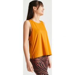 Koszulka fitness damska Domyos bez rękawów. Białe t-shirty sportowe DOMYOS, bez wzorów, z elastanu, bez ramiączek, na fitness i siłownię. Za 54.99 zł.