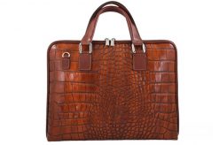 Torba na laptopa skórzana BARBERINI'S 118/1-6 brązowa. Brązowe torby na laptopa Barberinis, bez wzorów, ze skóry, na ramię, z tłoczeniem. Za 359.99 zł.