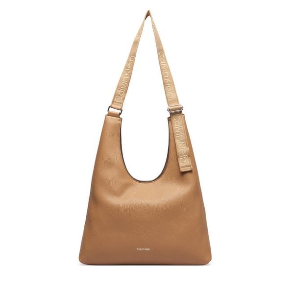 Torebka Calvin Klein. Brązowe torebki klasyczne Calvin Klein, bez wzorów, klasyczne, bez dodatków. Za 569.99 zł.