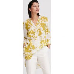 Bluzka z motywem tie-dye - Wielobarwny. Bluzki Reserved, bez wzorów, bez kołnierzyka, bez ramiączek. W wyprzedaży za 59.99 zł.