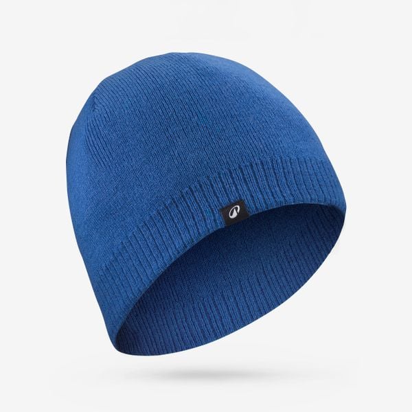 Czapka narciarska dla dorosłych Wedze Simple 100. Niebieskie czapki zimowe WED'ZE, bez wzorów, z dzianiny, sportowe. Za 29.99 zł.