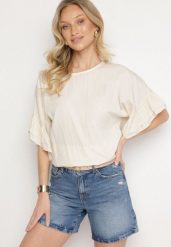 Beżowa Bluzka z Wiskozą Typu Nietoperz z Falbankami Davienna. Brązowe bluzki Born2be, uniwersalny, bez wzorów, z jeansu, eleganckie, bez kołnierzyka, bez ramiączek. Za 89.99 zł.