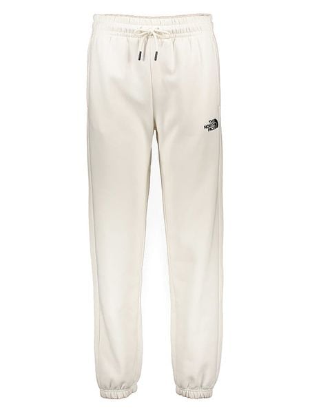 The North Face Spodnie dresowe "Essential" w kolorze białym rozmiar: XS. Białe spodnie dresowe The North Face, bez wzorów, z dresówki. Za 193.70 zł.