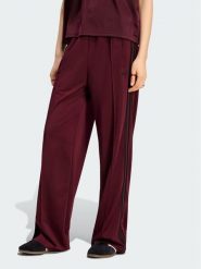 Adidas Spodnie dresowe Firebird Loose Tracksuit KS4669 Bordowy Loose Fit. Czerwone spodnie dresowe adidas, bez wzorów, z dresówki. Za 298.99 zł.