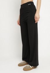 Czarne Szerokie Spodnie z Wysokim Stanem Efalissa. Czarne jeansy Born2be, bez wzorów, z jeansu, eleganckie, z podwyższonym stanem. Za 69.99 zł.