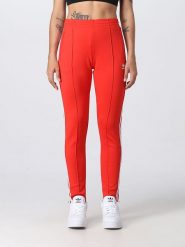 Adidas Spodnie dresowe w kolorze czerwonym rozmiar: 38. Czerwone spodnie dresowe adidas, bez wzorów, z dresówki. Za 127.65 zł.