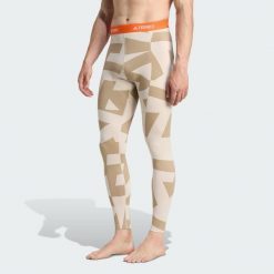 Legginsy bazowe Multi Synthetic Base Layer. Brązowe legginsy adidas, bez wzorów, sportowe. Za 219.00 zł.