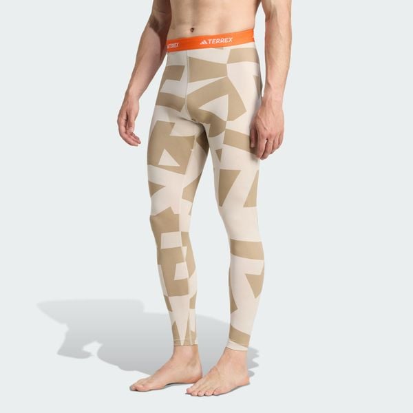 Legginsy bazowe Multi Synthetic Base Layer. Brązowe legginsy adidas, bez wzorów, sportowe. Za 219.00 zł.
