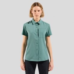 Koszula trekkingowa damska Odlo Hikking Essentials. Zielone koszule ODLO, l, bez wzorów, z materiału, casualowe, bez kołnierzyka, bez ramiączek. Za 317.00 zł.