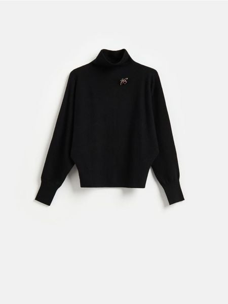 Sweter z ozdobnym detalem - czarny. Czarne swetry Reserved, l, bez wzorów, z dzianiny, bez ramiączek. Za 149.99 zł.