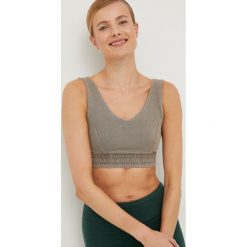 Reebok Classic biustonosz kolor brązowy gładki. Brązowe biustonosze Reebok Classic, bez wzorów, z materiału. Za 119.99 zł.