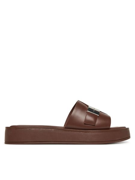Calvin Klein Klapki Flatform Slide W/Ck Hw - Lth HW0HW02368 Brązowy. Brązowe klapki Calvin Klein, bez wzorów, ze skóry, bez obcasa, bez zapięcia. Za 329.99 zł.