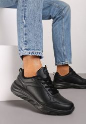 Czarne Klasyczne Płaskie Buty Sportowe Sneakersy z Tłoczoną Podeszwą Velandria. Czarne buty sportowe lifestyle Born2be, bez wzorów, z bawełny, bez zapięcia. W wyprzedaży za 110.49 zł.