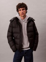 Calvin Klein Jeans kurtka puchowa Kobiety Sztuczne włókno czarny, L. Czarne kurtki Calvin Klein Jeans, l, bez wzorów, z jeansu, bez kaptura. Za 849.95 zł.