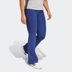 Legginsy fitness damskie ADIDAS. Niebieskie legginsy adidas, bez wzorów, z bawełny, sportowe. Za 129.99 zł.