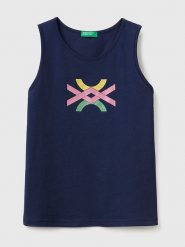 Benetton Top w kolorze granatowym rozmiar: 130. Niebieskie topy Benetton, bez wzorów, z bawełny, bez kołnierzyka, bez ramiączek. Za 24.23 zł.