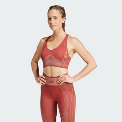 Biustonosz AEROKNIT Training Light Support. Czerwone biustonosze sportowe adidas, bez wzorów, na fitness i siłownię, climacool (adidas). Za 229.00 zł.