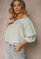 Niebieska Bluzka z Wiskozą Ozdobiona Falbanami Melzivia. Niebieskie bluzki Renee, bez wzorów, z wiskozy, eleganckie, bez kołnierzyka, bez ramiączek. W wyprzedaży za 43.99 zł.