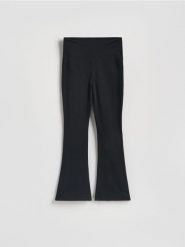 Legginsy flare - czarny. Czarne legginsy Reserved, bez wzorów, z bawełny. Za 89.99 zł.