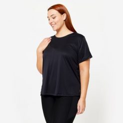 Koszulka fitness damska Domyos Plus Size krótki rękaw. Czarne t-shirty sportowe DOMYOS, l, bez wzorów, z dzianiny, bez ramiączek, na fitness i siłownię. Za 39.99 zł.