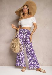 Fioletowe Spodnie High Waist z Wiskozy w Kwiaty z Szerokimi Nogawkami i Gumką w Pasie Gronea. Fioletowe jeansy Renee, na lato, bez wzorów, z jeansu, z podwyższonym stanem. W wyprzedaży za 39.99 zł.