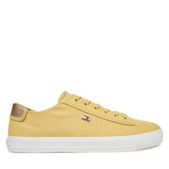 Tenisówki Tommy Hilfiger. Żółte trampki Tommy Hilfiger, bez wzorów, bez zapięcia. Za 239.99 zł.