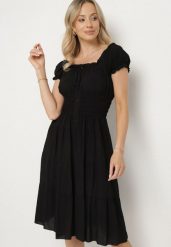 Czarna Bawełniana Rozkloszowana Sukienka z Guzikami i Bufiastymi Rękawami Annivi. Czarne sukienki Born2be, na co dzień, l, bez wzorów, z bawełny, eleganckie, bez kołnierzyka, bez ramiączek, midi, rozkloszowane. W wyprzedaży za 38.24 zł.