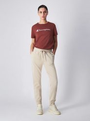 Champion Spodnie dresowe w kolorze beżowym rozmiar: XL. Brązowe spodnie dresowe Champion, bez wzorów, z dresówki. Za 74.99 zł.