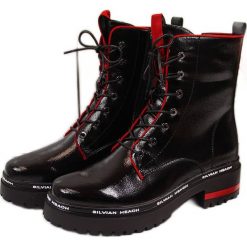 Workery damskie lakierowane ocieplane czarne Filippo. Czarne botki Filippo, bez wzorów, z lakierowanej skóry, eleganckie, bez obcasa, bez zapięcia. Za 345.58 zł.