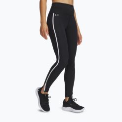 Legginsy Under Armour Motion Piped. Czarne legginsy Under Armour, bez wzorów, sportowe. Za 159.99 zł.