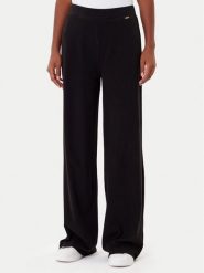 Guess Spodnie dresowe O4BB02 K7611 Czarny Regular Fit. Czarne spodnie dresowe Guess, z aplikacjami, z dresówki. Za 159.99 zł.