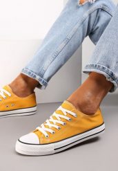 Żółte Trampki Lakelet. Żółte trampki Renee, bez wzorów, z gumy, klasyczne, przed kostkę, bez zapięcia. W wyprzedaży za 47.99 zł.