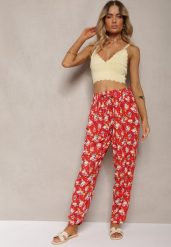 Czerwone Wiskozowe Spodnie z Gumką w Pasie w Kwiatowy Wzór Tellnama. Czerwone jeansy Renee, na wiosnę, l, bez wzorów, z jeansu, eleganckie. W wyprzedaży za 20.99 zł.