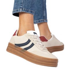 Beżowe sneakersy trampki damskie z granatowym dodatkiem białe. Białe trampki bez wzorów, z syntetyku, sportowe, przed kostkę, bez zapięcia. Za 96.19 zł.