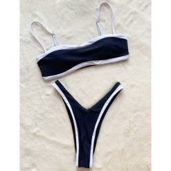 Dwuczęściowy strój kąpielowy z odważnym wycięciem Fransien. Białe bikini Intica, bez wzorów, z tkaniny. Za 159.00 zł.