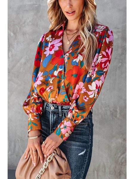 Milan Kiss Bluzka w kolorze pomarańczowym ze wzorem rozmiar: XL. Pomarańczowe bluzki Milan Kiss, xl, bez wzorów, bez kołnierzyka, bez ramiączek. Za 109.26 zł.