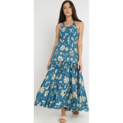 Niebieska Sukienka z Wiskozy Damaleia. Niebieskie sukienki Born2be, m, z aplikacjami, z tkaniny, bez kołnierzyka, bez ramiączek, maxi, dopasowane. Za 139.99 zł.