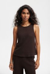 TOP SUMMER CZEKOLADOWY XS - Flawless. Brązowe topy Flawless, xs, w ażurowe wzory, z dzianiny, eleganckie, bez kołnierzyka, bez ramiączek. Za 297.00 zł.