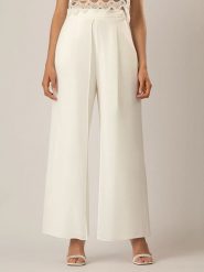 APART Spodnie w kolorze kremowym rozmiar: 36. Brązowe spodnie materiałowe Apart, bez wzorów, z materiału, z podwyższonym stanem. Za 219.60 zł.