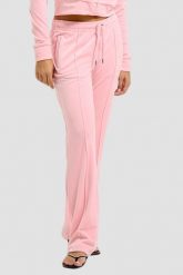 JUICY COUTURE Różowe damskie spodnie dresowe Tina Trackpants. Czerwone spodnie dresowe Juicy Couture, bez wzorów, z dresówki. W wyprzedaży za 346.99 zł.
