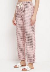 Różowo-Czarne Spodnie w Geometryczny Print z Wysokim Stanem Lolla. Czerwone jeansy Born2be, na lato, l, bez wzorów, z jeansu, z podwyższonym stanem. Za 59.99 zł.