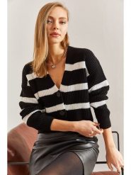 Bianco Lucci Kardigan w kolorze czarno-białym rozmiar: S. Czarne swetry Bianco Lucci, s, bez wzorów, ze splotem, bez ramiączek. Za 52.92 zł.