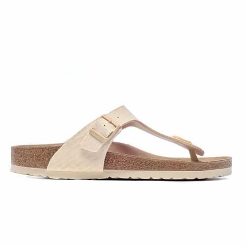 Klapki damskie Birkenstock Gizeh Tex Canvas Eggshell Veg. Żółte klapki Birkenstock, bez wzorów, z materiału, sportowe, bez obcasa, bez zapięcia. W wyprzedaży za 389.40 zł.